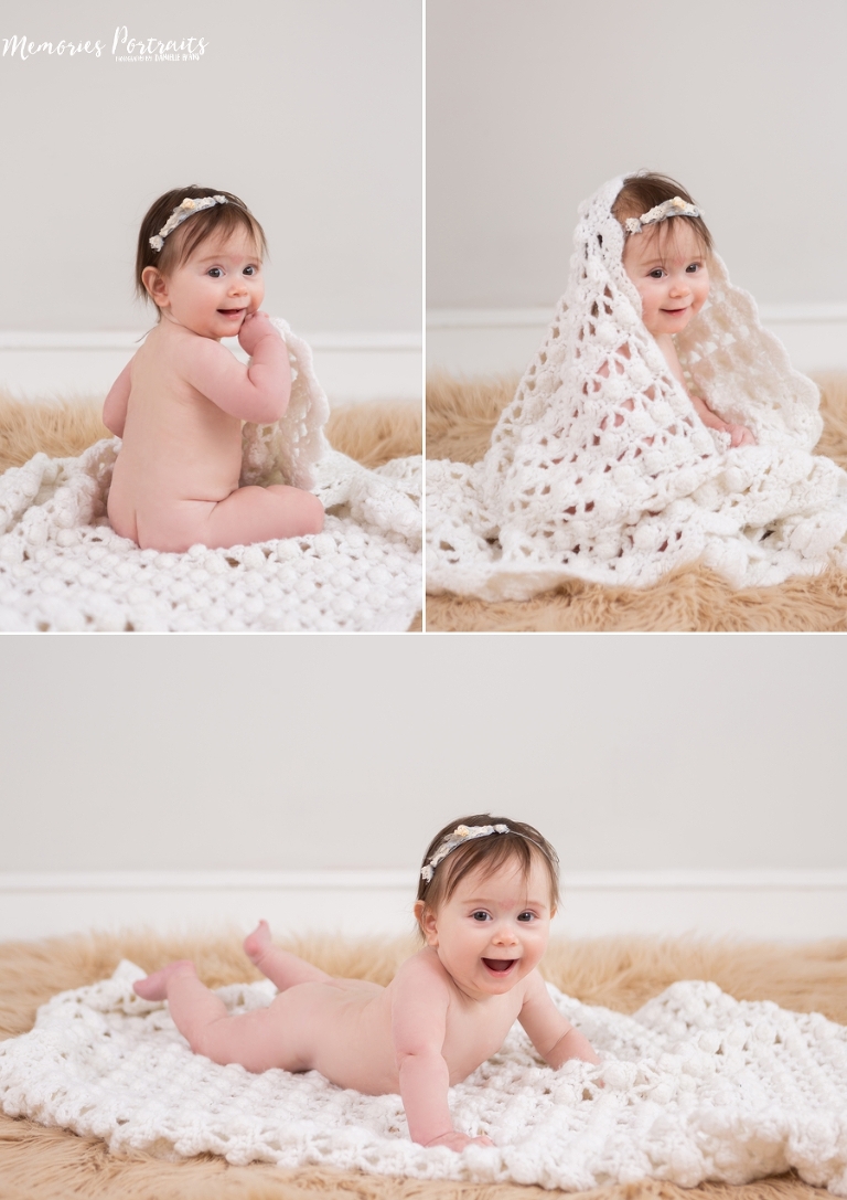 6 month old baby girl in portrait studio with bare bum shots while she plays on a fluffy carpet and shot white crocheted blanket