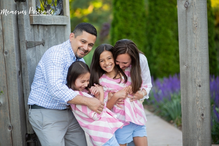 family laughing and smiling at the knoxville botanical gardens